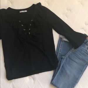 Criss cross tie front ruffle top